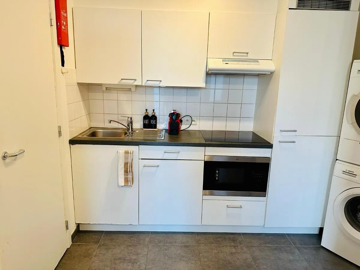 Urbanstay Suites Apartment In Charming Sablon contacts